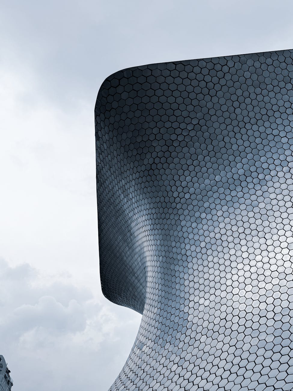 Stunning view of the Soumaya Museum's modern facade in Mexico City, CDMX.